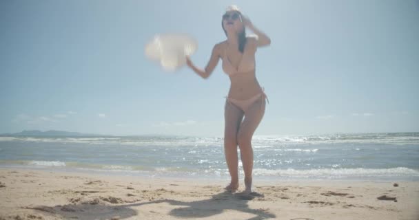 Slow Motion Smiling Young Bikini Sexy Asian Woman Playing Freedom — стоковое видео