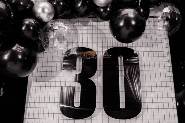 Birthday thirtieth anniversary decoration with black and silver balloons — Stock Photo, Image