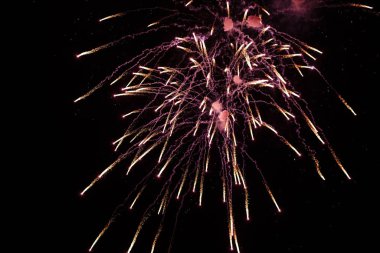 Real colored Fireworks on Deep Black Background Sky on Fireworks festival show before independence day on 4 of July
