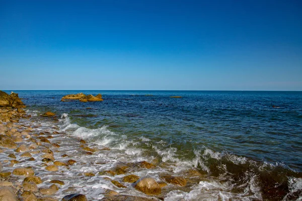 Landscape photo of rocks in the sea in morning. sea in morning.
