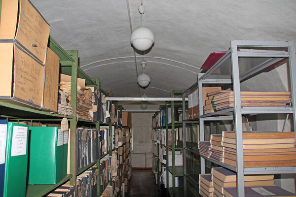 Eniseysk, Russia, 08/23/2012, Illustrative editorial Old archive storage with documents on shelves, vintage, history.