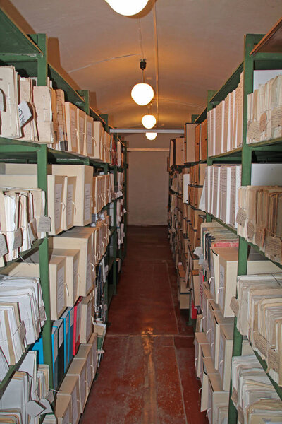 Eniseysk, Russia, 08/23/2012, Illustrative editorial Old archive storage with documents on shelves, vintage, history.