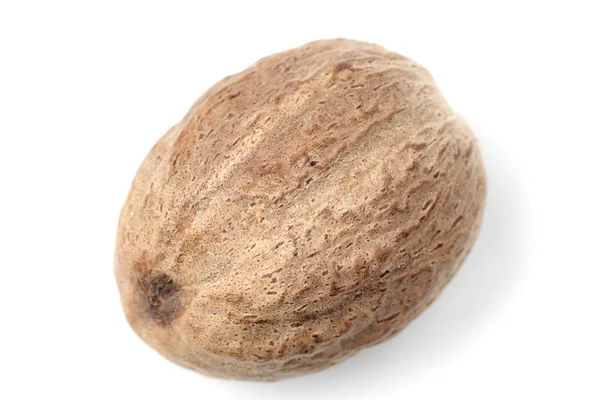 Nutmeg close-up on a white background. — 스톡 사진