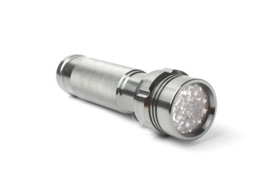 Metal LED flashlight on a white background, isolate.
