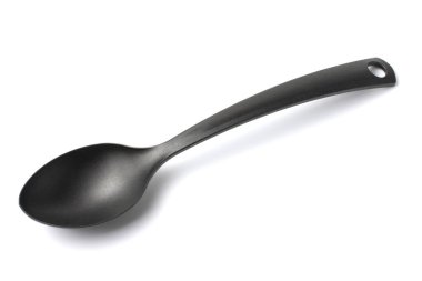 Black plastic big spoon for home, white background, isolate.