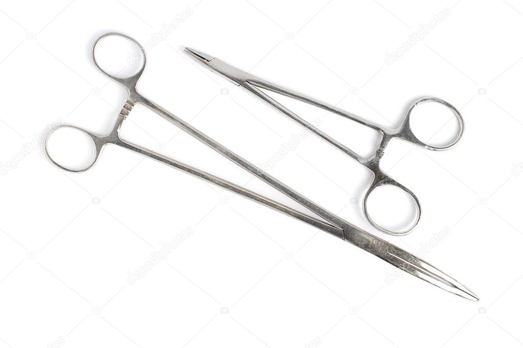 Surgical needle holders, close-up, isolate, white background, top view.