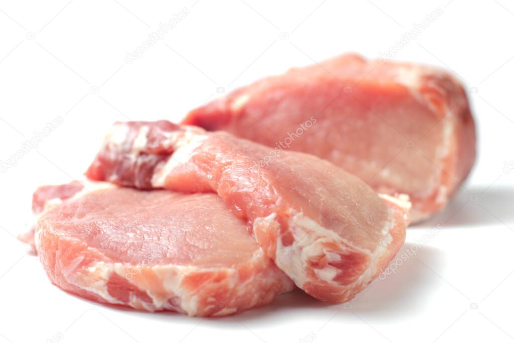 Large pieces of raw pork steak, wide banner, close-up, white background, isolate.