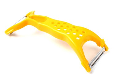 Mutfak için sebze ve peynir makası, sarı, beyaz arka plan, yakın plan..