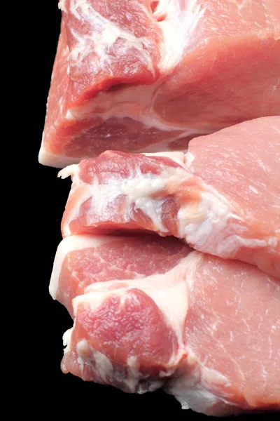 Cijfers Van Rauwe Varkenssteak Close Zwarte Achtergrond Kopieerruimte Isoleren — Stockfoto