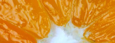 Geniş görüş. Portakal rengi yakın çekim, makro fotoğraf. Vejetaryen yemeği. Düz konum, üst görünüm, kopyalama alanı.