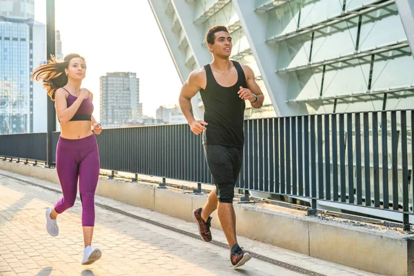 Full Length Young Couple Sport Clothing Running City Street Together Stock Picture