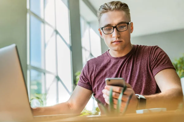 Confident Young Man Casual Wear Holding Smart Phone Looking While — Stock Photo, Image