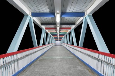 Modern empty foot bridge at night clipart