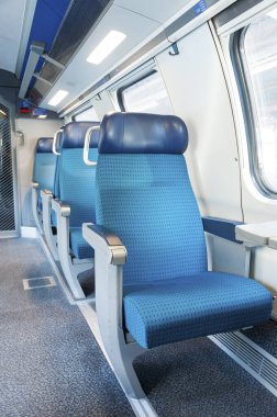 Interior view of seat in modern train. transportation background