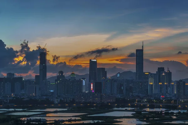 Skyline of Shenzhen City, China at dusk. Viewed from Hong Kong border — Stock Photo, Image