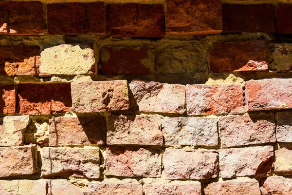 Textur roter Ziegelwände mit Rissen — Stockfoto