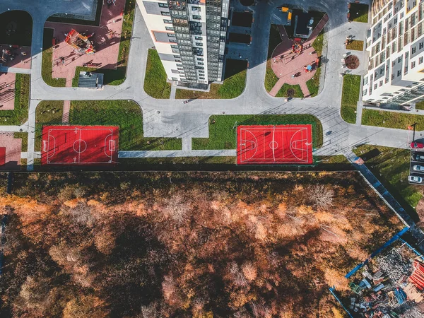 Ariel view basketball court in the yard of an apartment building. Russia, Saint Petersburg