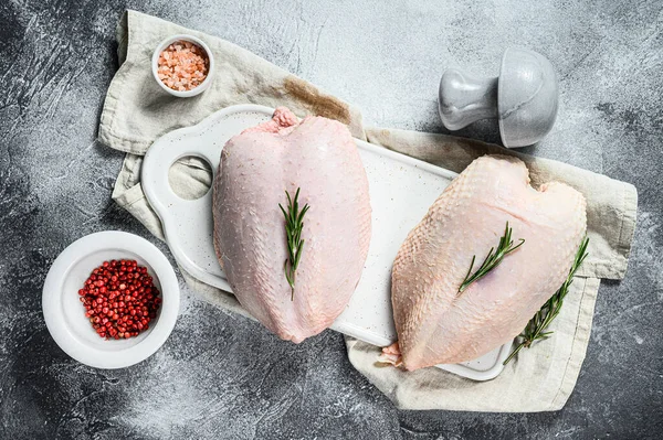 Raw chicken Breasts, fresh fillets with skin. Organic farm bird. Gray background — Stock Photo, Image