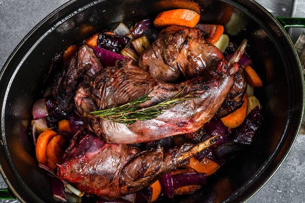 Wild hare with Vegetable in White Wine Sauce, Stewpot. Organic meat. Cooking stew. Top view