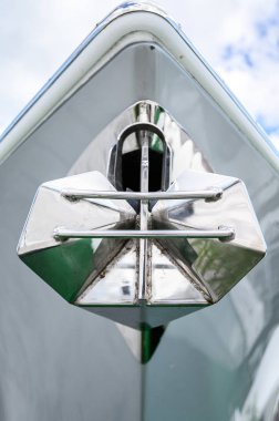 Polished new anchor on the yacht. Close up. Tenerife, Canary Islands, Spain