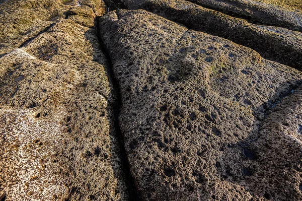 Spiaggia di pietra vulcanica nella città di La Caletta. Tenerife, Isole Canarie, Spagna — Foto Stock