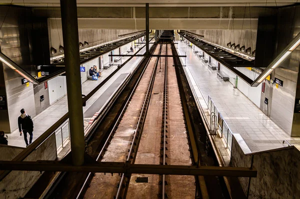 Interior of underground metro station. People on the platform. 03.01.2020 Barcelona, Spain — Stock Photo, Image