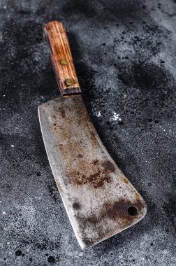 Eski çizik siyah dokuda et satırı. Karanlık arka plan. Üst görünüm