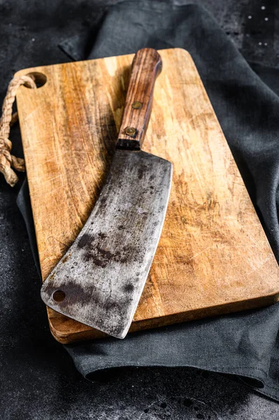 Tabla de cortar de cocina vintage sobre fondo de madera