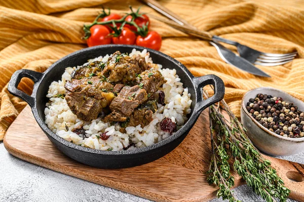 Madras beef with basmati rice, Indian food. White background. Top view