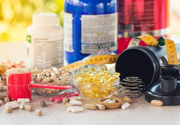 Nutritional supplements in capsules and tablets. — Stock Photo, Image