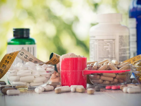 Nutritional supplements in capsules and tablets. — Stock Photo, Image