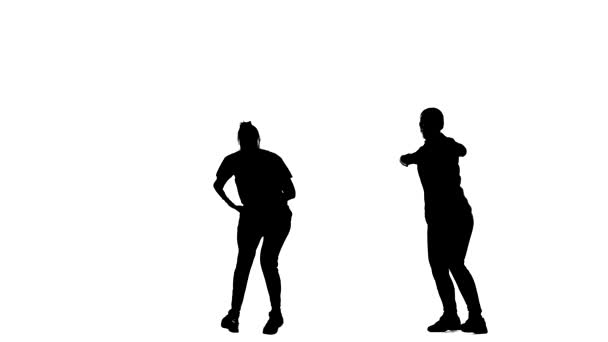 白い背景に黒いシルエット 女の子のデュエットダンスヒップホップストリートダンス孤立 — ストック動画
