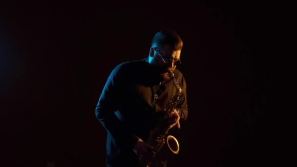 Musician Plays Saxophone Black Background Isolated Solo — Stock Video