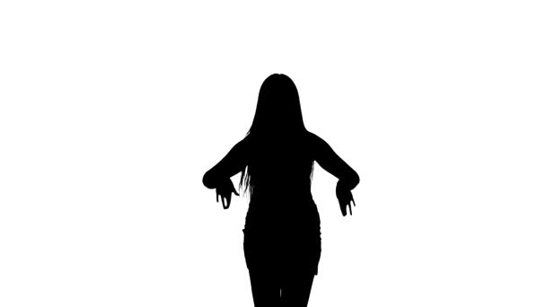 白い背景に黒のシルエット 若い美しい女性がベリーダンス 東洋のダンスを踊る 中ロングショット — ストック動画