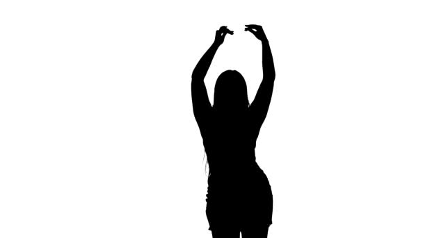 一个有着一头长发的年轻漂亮姑娘的中长照 肚皮舞 东方舞 异国情调的舞 白色背景上的黑色轮廓 — 图库视频影像
