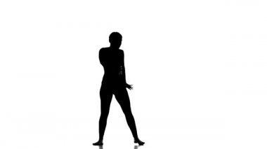 Beyaz arka planda siyah bir siluet, genç ve güzel bir kız dansçı, modern bale dansı, ağır çekim