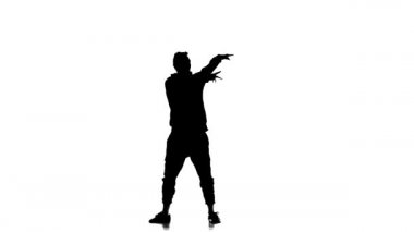 Beyaz arka planda siyah siluet, enerjik genç adam güçlü bir şekilde hip hop, freestyle, sokak dansı yapıyor, karmaşık hareketler sergiliyor.