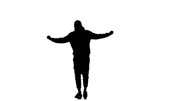 白色背景上的黑色轮廓 年轻精力充沛的男子跳嘻哈 自由式 慢动作 — 图库视频影像