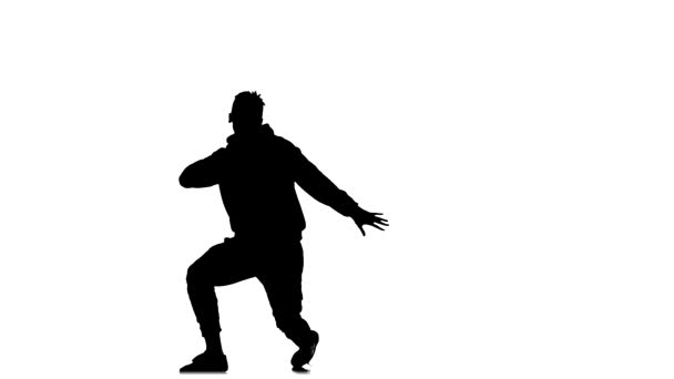 白色背景上的黑色轮廓 年轻精力充沛的小伙子跳嘻哈 自由式 慢动作 — 图库视频影像