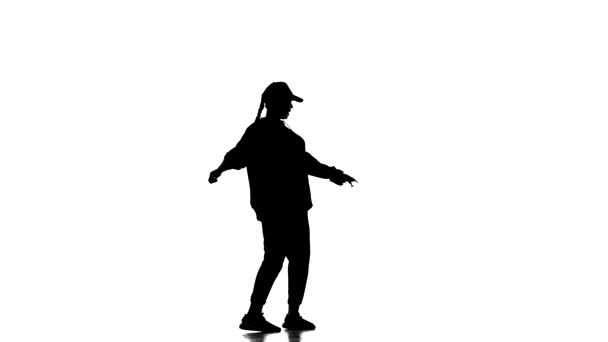 Fekete Sziluett Fehér Háttérrel Fiatal Gyönyörű Lány Táncos Melegítőben Baseball — Stock videók