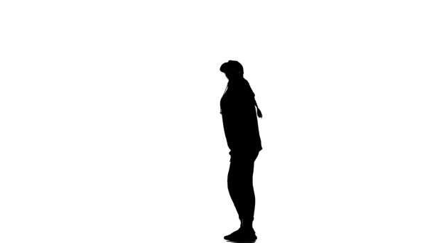 Чорний Силует Білому Тлі Молода Красива Дівчина Танцює Треккостюмі Бейсбольній — стокове відео