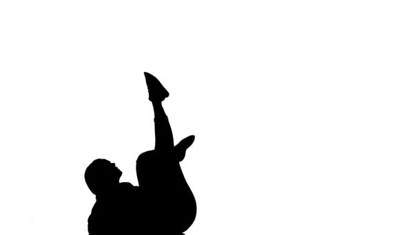 白色背景上的黑色轮廓 年轻美丽的女舞蹈家跳着同时代的舞 现代街舞 在地板上表演着优美的动作 动作缓慢 — 图库视频影像