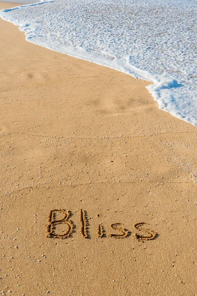 Slovo Bliss Napsané Písku Pláži Vlnou — Stock fotografie