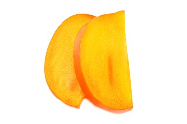 Beyaz arka planda izole edilmiş taze olgun hurma dilimleri. en üstteki görünüm