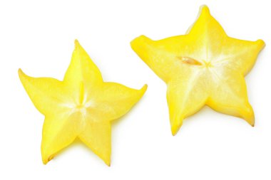 Beyaz arka planda olgun yıldız meyveli karambola ya da yıldız elmalı (starfruit). en üstteki görünüm