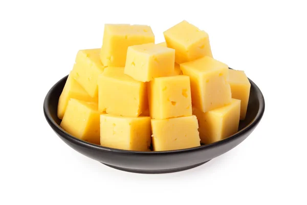 Schneiden Von Käse Einem Schwarzen Teller Isoliert Auf Weißem Hintergrund — Stockfoto