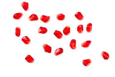 Beyaz arka planda izole edilmiş nar tohumları. en üstteki görünüm