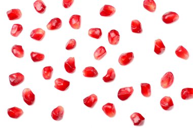 Beyaz arka planda izole edilmiş nar tohumları. en üstteki görünüm