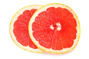 Sağlıklı yemek. Dilimlenmiş greyfurt beyaz arka planda izole edilmiş. en üstteki görünüm