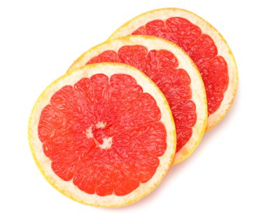 Sağlıklı yemek. Dilimlenmiş greyfurt beyaz arka planda izole edilmiş. en üstteki görünüm